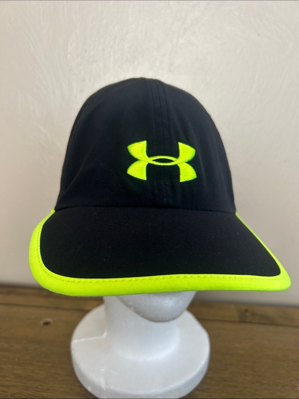 Under Armour Shadow Lightweight Black Cap W/Neon Yellow Trim & Embroidered Logo.